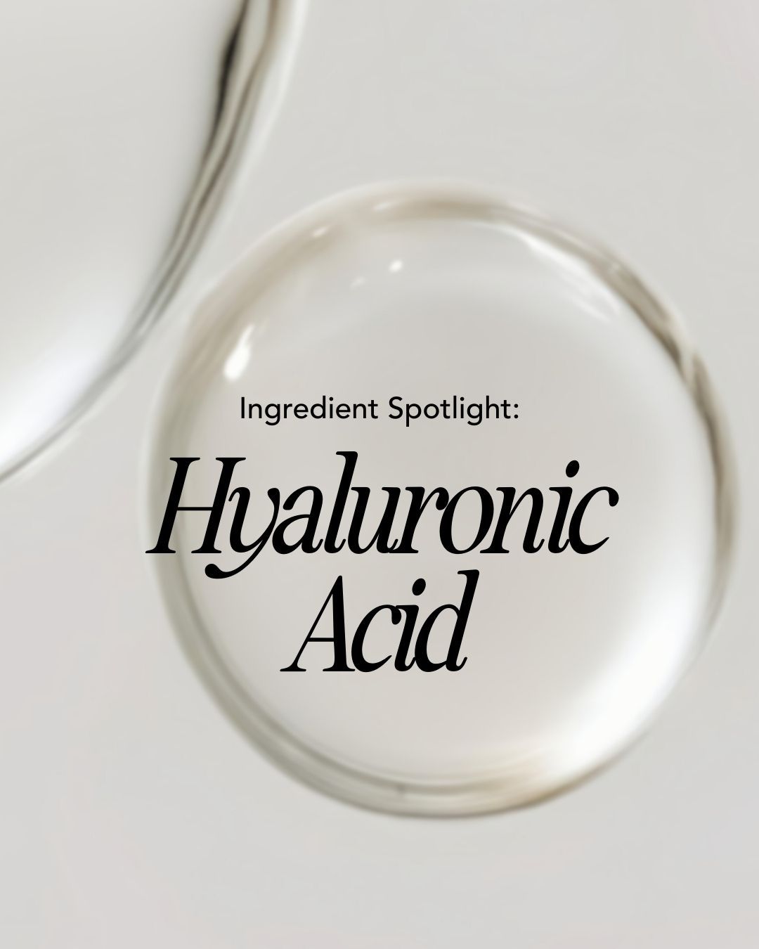 Woman pressing hyaluronic acid serum into damp skin beside a light emulsion and sunscreen in a bright summer bathroom.