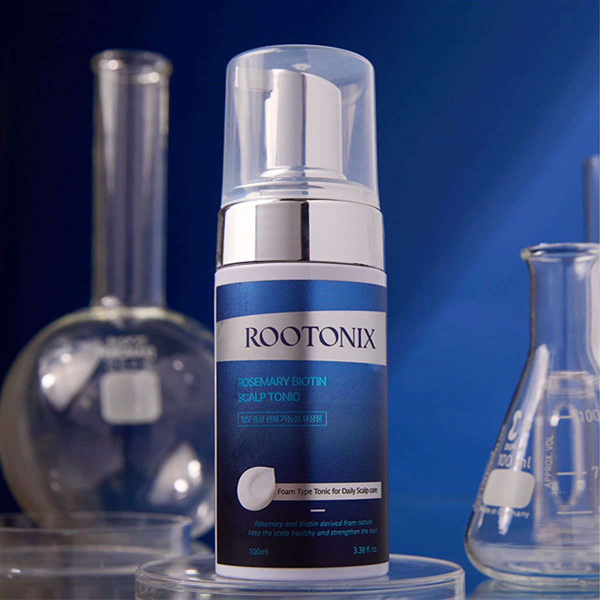 ROOTONIX Rosemary Biotin Scalp Tonic bottle with laboratory glassware